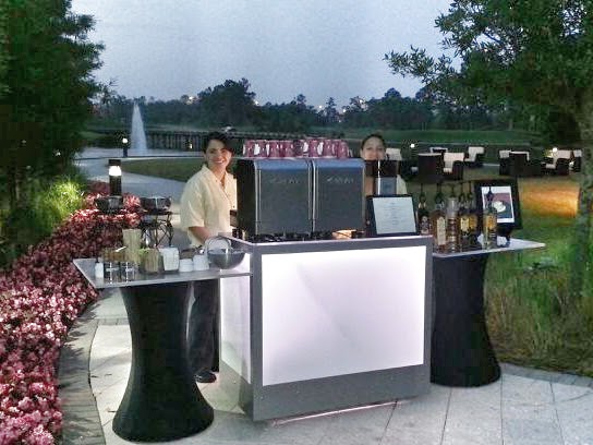 Espresso bar serving guests at a trade show booth
